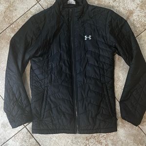 Under Armor Storm winter jacket. Very warm and great against wind. Hardly worn